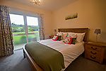 double bedroom downstairs with country views